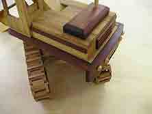 a view of the rear of Excavator wooden model